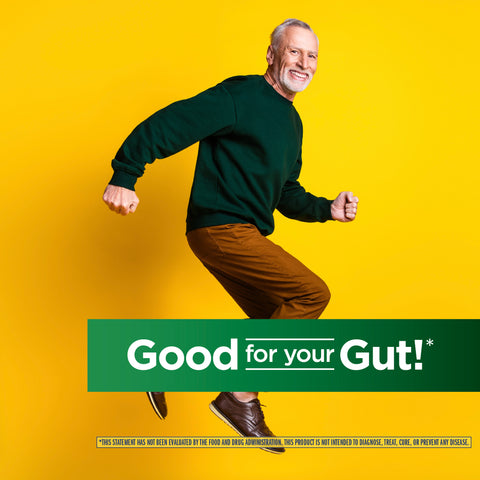 View 7 A joyful senior man runs energetically, promoting Ultimate Flora Adult 50+.