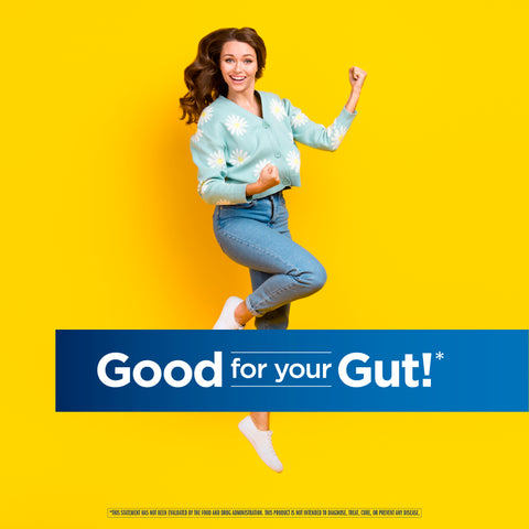 View 6 Young woman jumping, fists clenched, with a blue banner saying 'Good for your Gut!' for Ult Flora Extra Care.