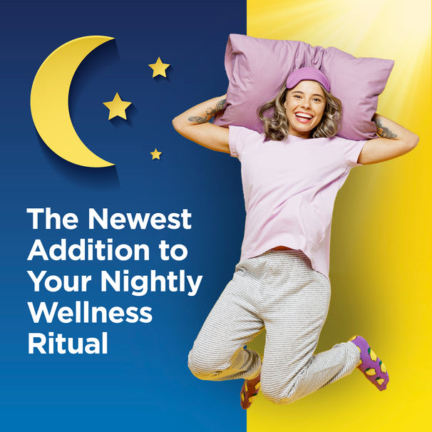 View 6 Young adult woman jumps happily in pajamas, holding a pillow, with text 'The Newest Addition to Your Nightly Wellness Ritual'.