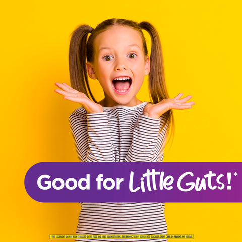 View 5 A young girl smiles excitedly; a purple banner reads 'Good for Little Guts!' for Ult Flora Kids.